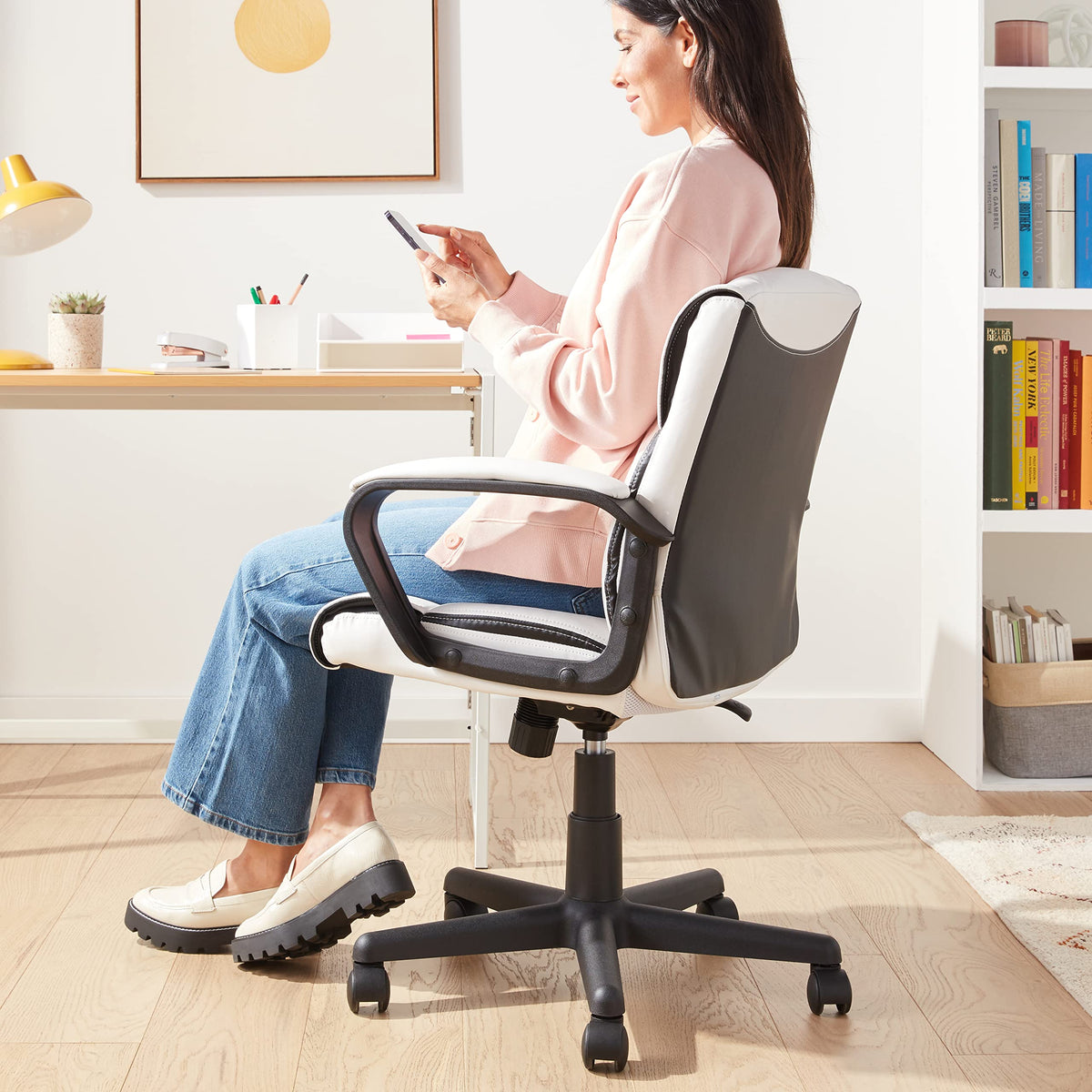 Amazon Basics Office Task Chair with Adjustable Height, 360° Swivel, Padded Armrests, Mid-Back, Rolling, 275 Pound Capacity, 24.2"D x 24"W x 34.8"H, Black Faux Leather